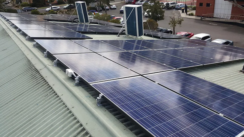 Commercial solar panels, on the Highton Bowling Club clubrooms roof Commercial solar panels installed by Velocity Solar on the Highton Bowling Club clubrooms roof