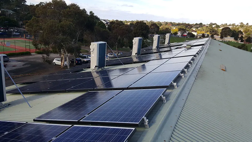Rows of solar panels, along the Highton Bowling Club roof Rows of solar panels installed by Velocity Solar along the Highton Bowling Club roof